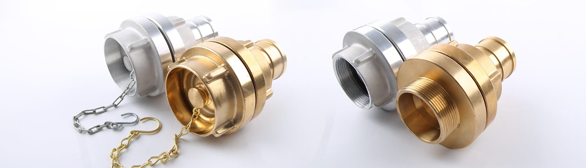 The picture shows four sets of storz couplings, which are two couplings join together in material of aluminum and brass.